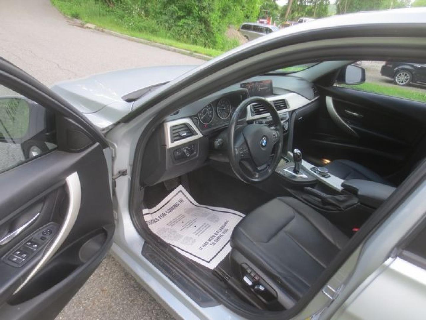 2016 Blue /Black BMW 3-Series (WBA8E5G59GN) with an 2.0l 4cyl Turbo engine, Automatic transmission, located at 270 US Route 6, Mahopac, NY, 10541, (845) 621-0895, 41.349022, -73.755280 - Photo#6